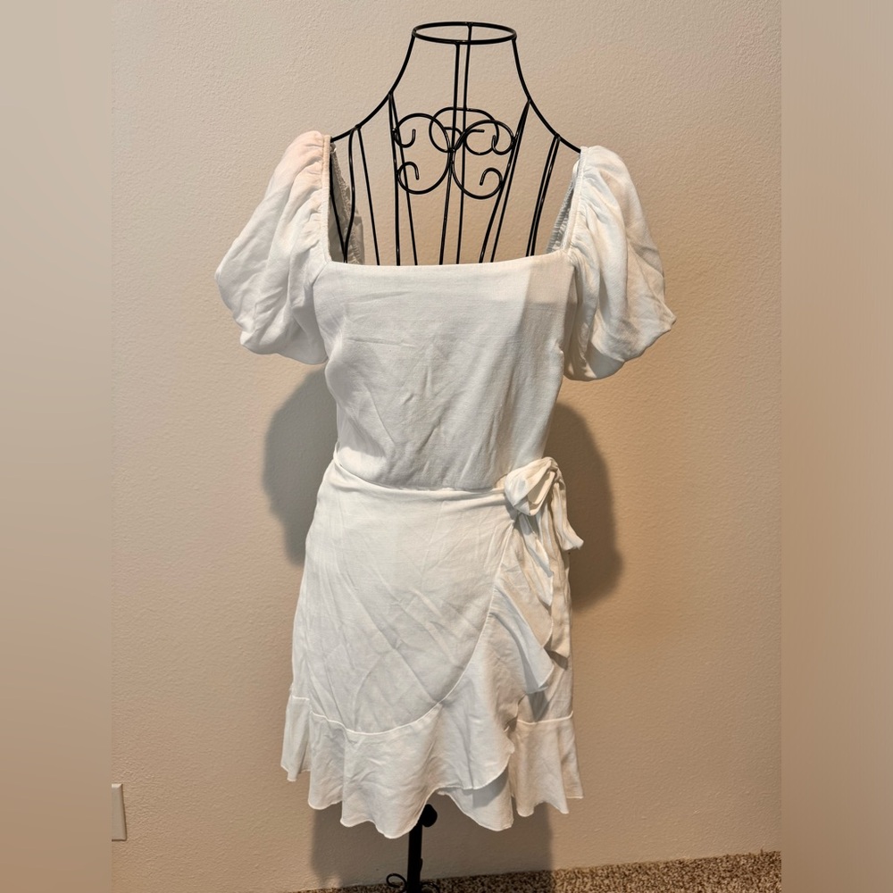 White dress with side tie